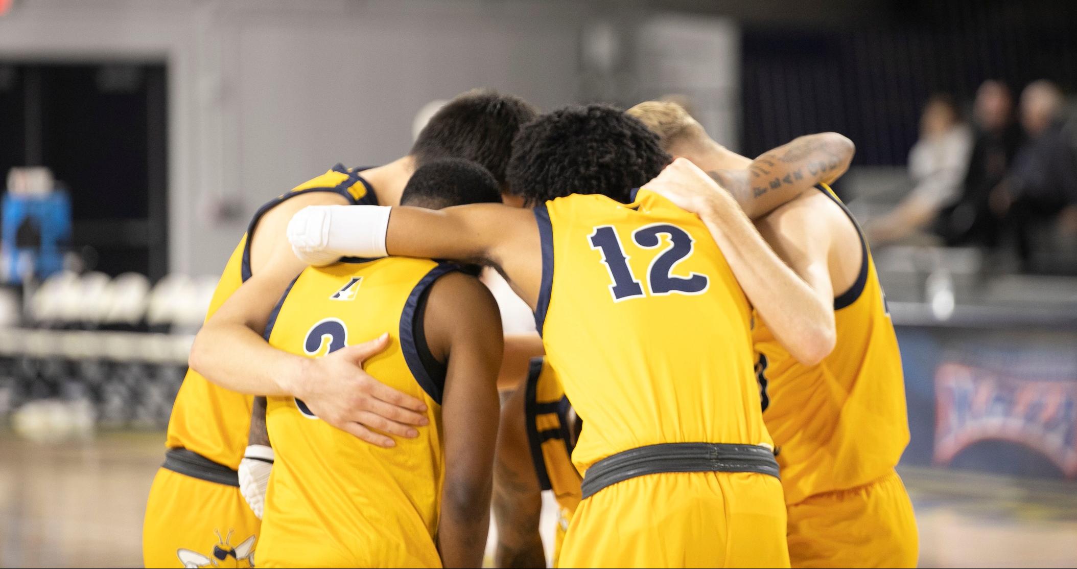 Men's Basketball Bests the Ravens