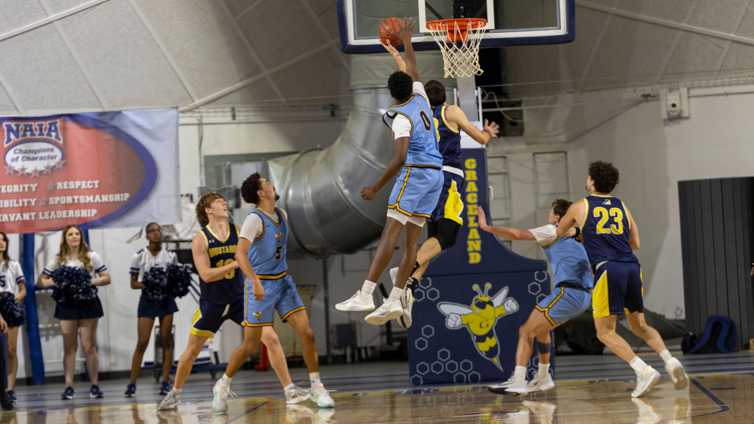 Busch&rsquo;s 35 Powers Graceland Past Mount Mercy, 97-75, to Maintain Heart Lead