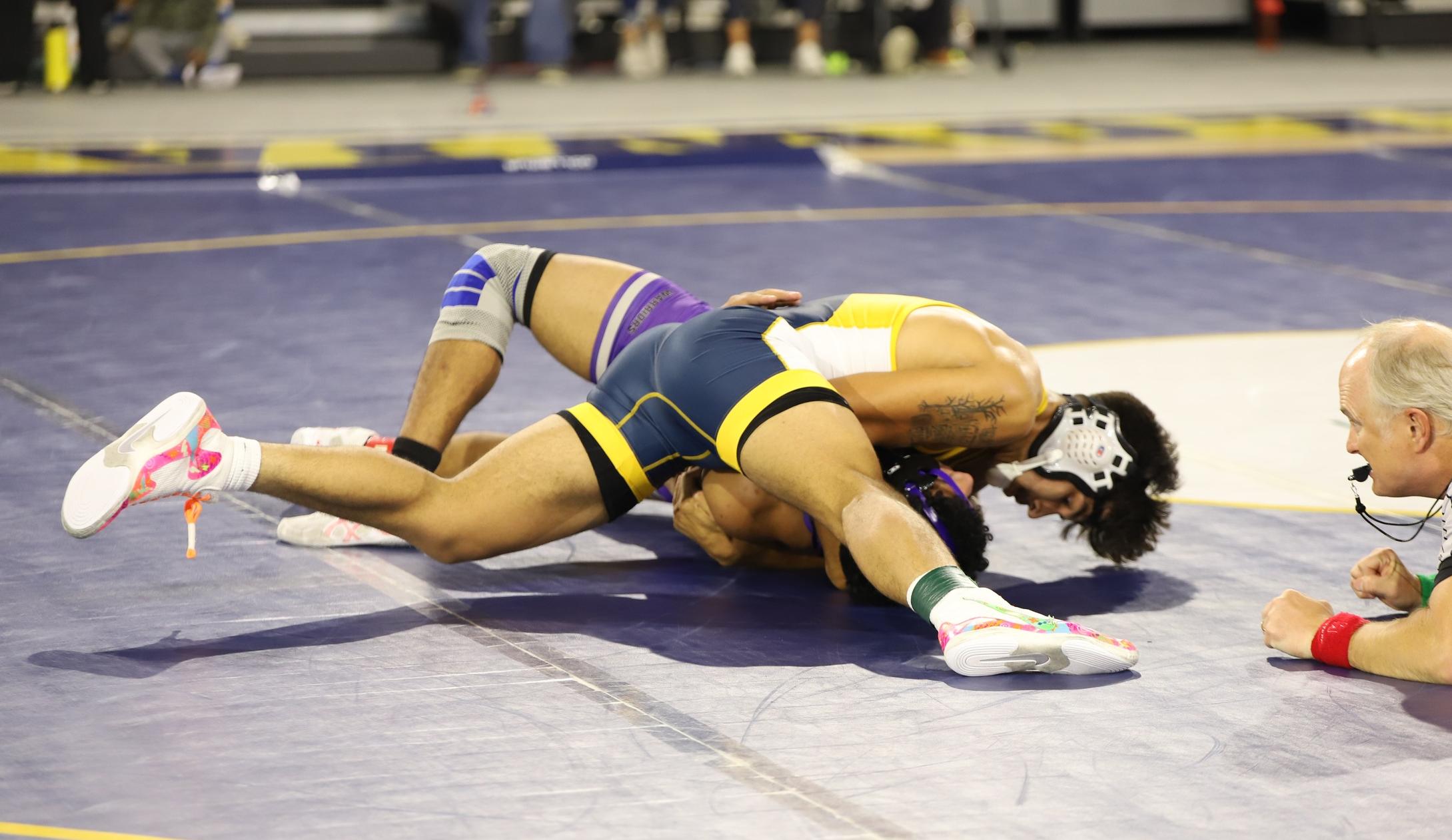 Wrestling Take Home Victory Over Warriors on Opening Night.