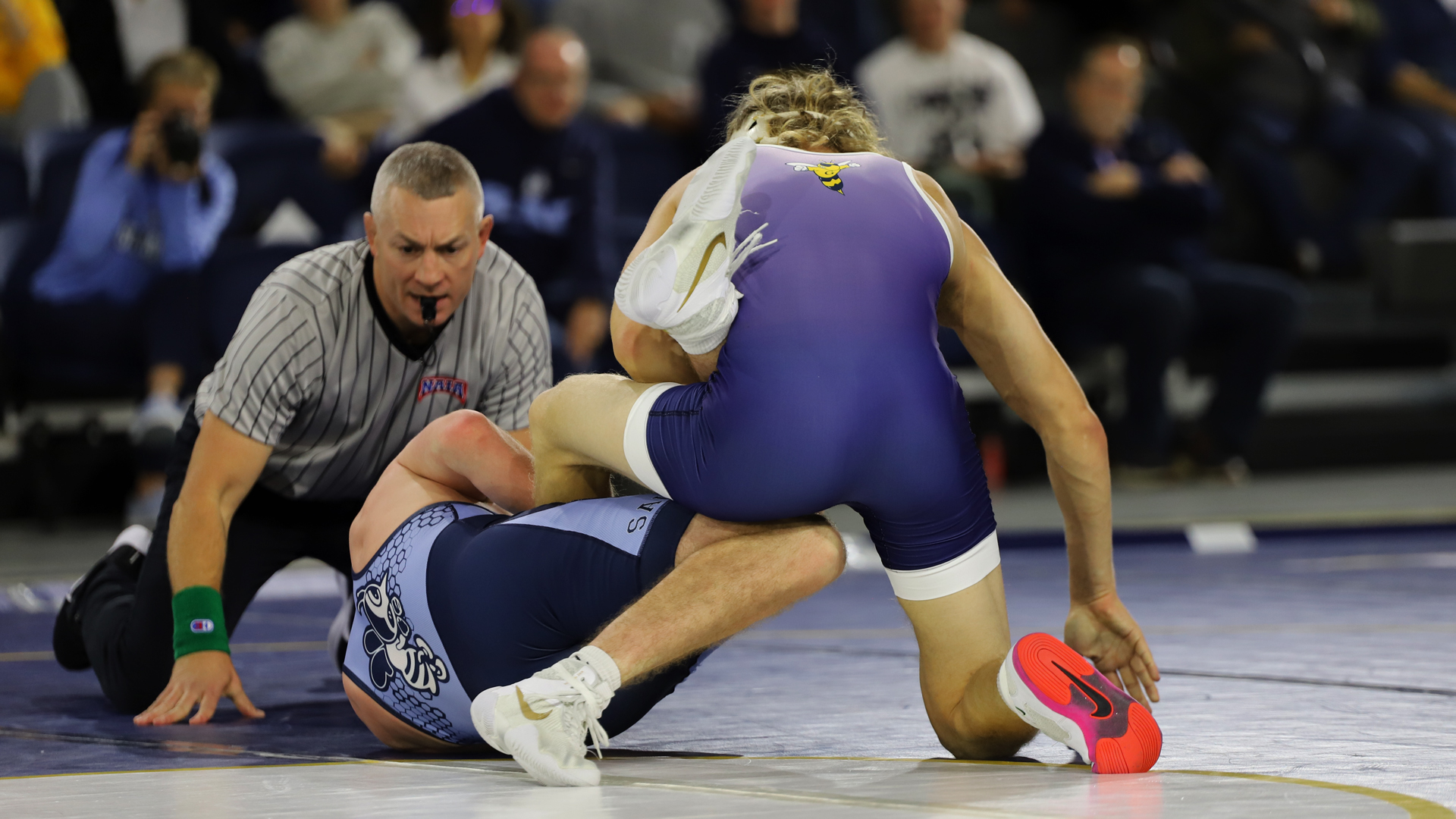 Wrestling Halted by St. Ambrose in Close Battle